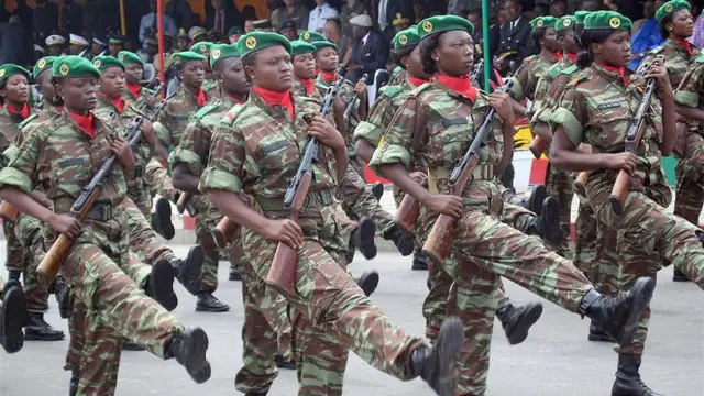 Members of the Benin army take part in a military procession celebrating the 46th anniversary of the independence of Benin in Cotonou, 01 August 2006. 