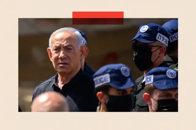 Benjamin Netanyahu reacts while visiting the area destroyed by an Iranian ballistic missile