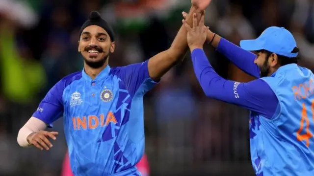 अर्शदीप सिंह और रोहित शर्मा