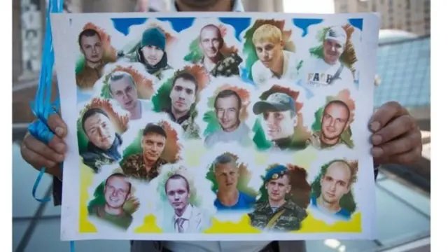 Плакат з фотографіями полонених, червень 2017 року. Акція "Забуття гірше зради!" на підтримку полонених