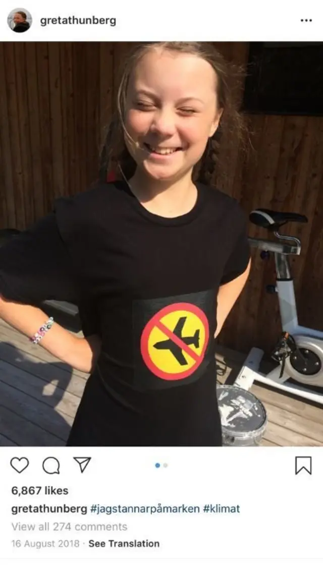 Greta in a no flying t-shirt