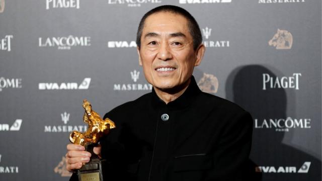 Chinese director Zhang Yimou poses backstage after winning Best Director for his movie Shadow at the 55th Golden Horse Awards in Taipei, Taiwan