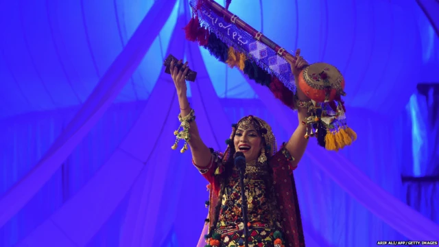 A Pakistani singer performs during the Mystic Music Sufi Festival dedicated to Sufi poetry, in Lahore (Pakistan's Punjab Region) on February 10, 2018.