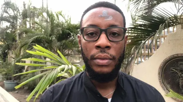 Some Catholic faithful comply with di directive for dem to wear black on di day