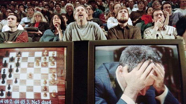 Chess enthusiasts gasp as they watch the epic Kasparov x Deep Blue six-game match in 1997