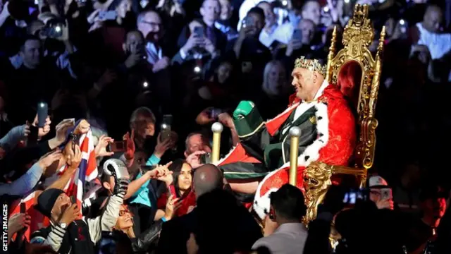 Tyson Fury ontop throne before im heavyweight fight against Deontay Wilder