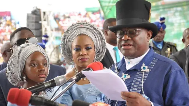 Govnor Nyesom Wike with im wife and daughter