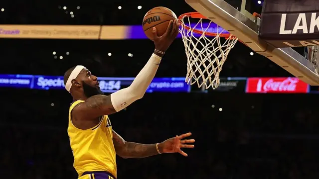 LeBron James scoring a basket during the Lakers defeat by the Oklahoma City Thunder