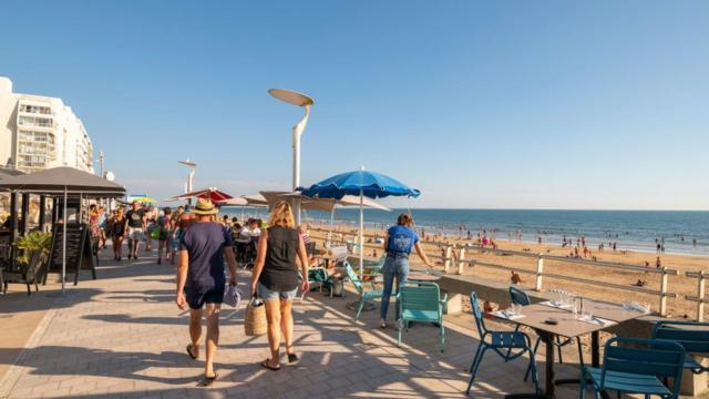 Saint-Gilles-Croix-de-Vie (central-western France): holidaymakers on the embankment and the main beach, on the coast of the Vendee department.