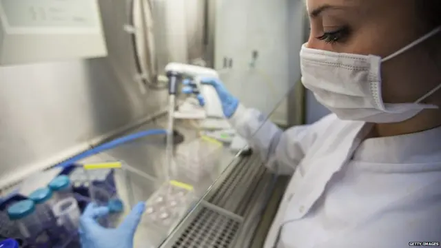 A researcher in a test lab