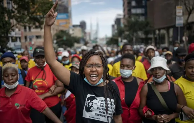 Students members of the African National Congress (ANC) and the Economic Freedom Fighters (EFF) march chanting slogans during a protest in Braamfontein, Johannesburg, South Africa - Wednesday 10 March 2021