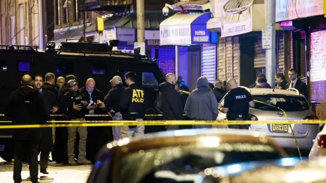 Police said three people in the shop may have been killed by the suspects