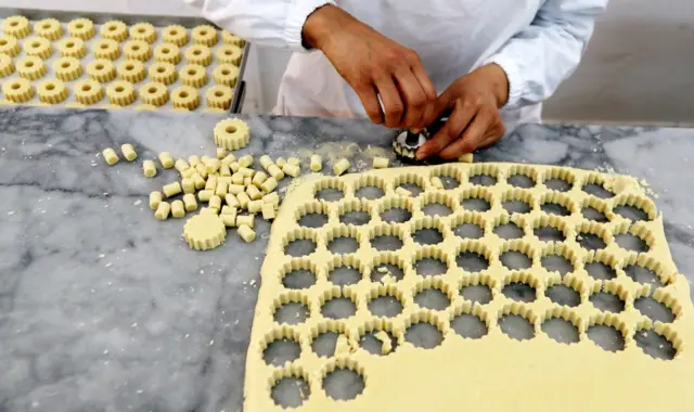 Tunisian woman makes Tunisian pastry at the Masmoudi pastry factory in Sfax, Tunisia, 09 April 2022.