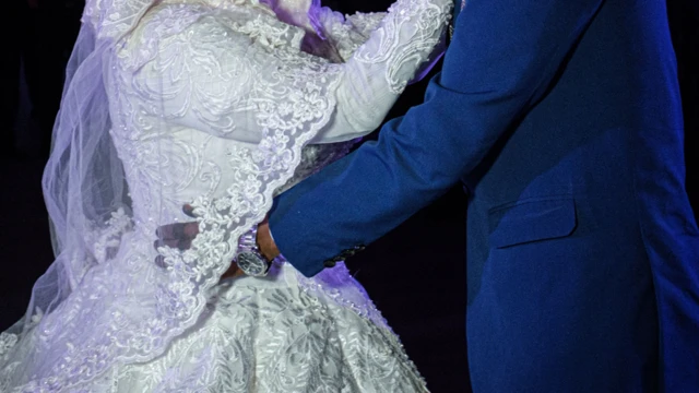 A bride and groom dancing in Sudan