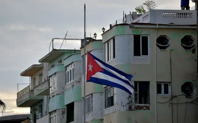 A Cuban national flag flies at half-mast in Havana on May 19, 2018.