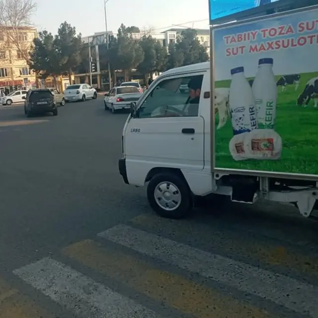 Кўчадаги машина