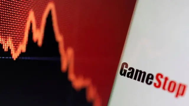 Combinación del logo de GameStop con una curva financiera