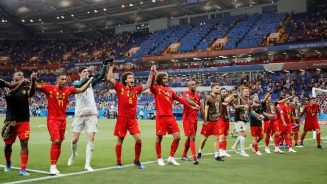 July 2, 2018 Belgium"s Marouane Fellaini, Vincent Kompany and team mates celebrate in front of their fans after the match