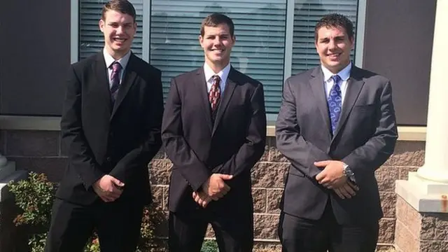 Zac with two brothers