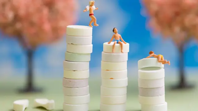 Art of kids playing on piles of sweets