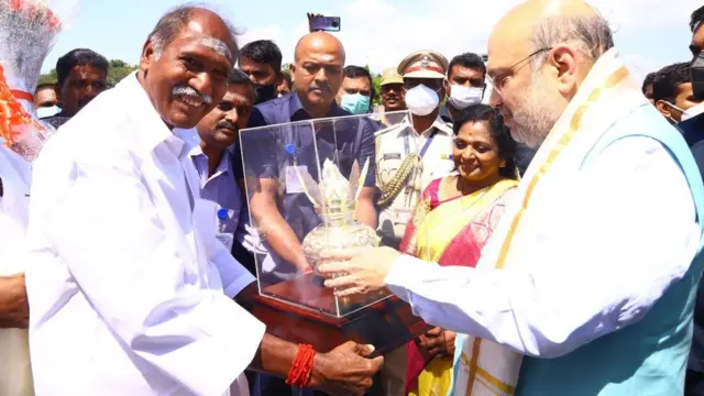 அமித்ஷாவை வரவேற்கும் புதுவை முதல்வர் ரங்கசாமி