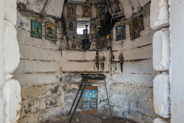 Interior view of a bunker in Albania with religious paintings