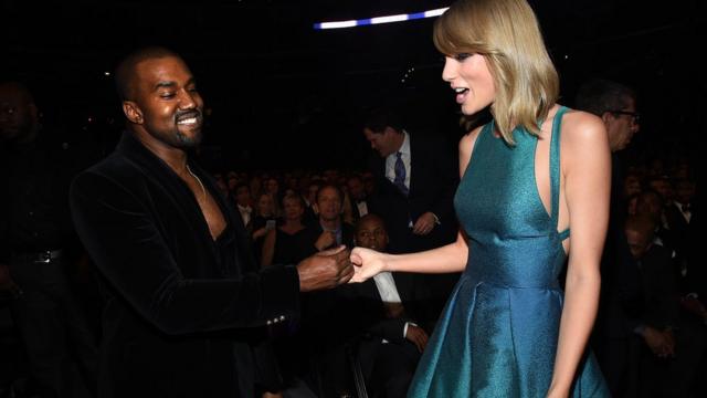 Kanye West and Taylor Swift at a ceremony in 2015