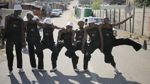 Members of the the Via Vyndal Pantsula group pose on a street in Alexandra township, Johannesburg, South Africa - Wednesday 1 February 2017