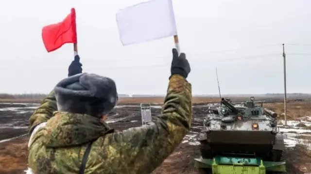 росія
