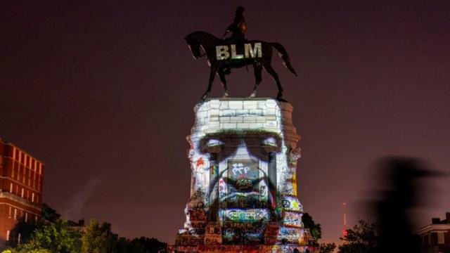 An image of George Floyd is projected on the statue of Confederate General Robert E. Lee in Richmond, Virginia, U.S. June 20, 2020