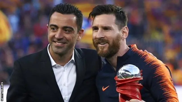 Xavi et Lionel Messi