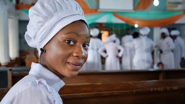 A member of the Celestial Church of Christ