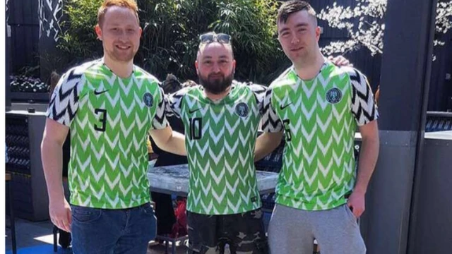 Three peopl standing