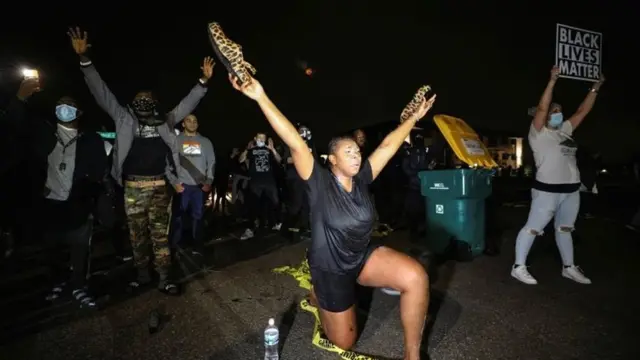 Protesters outside the police HQ in Brooklyn Center