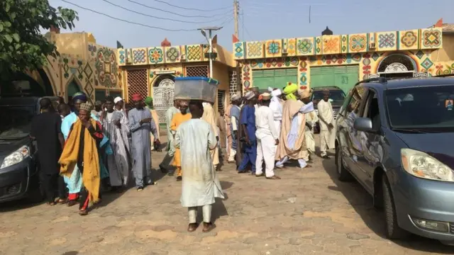 Pipo gada outside di palace a day to di coronation