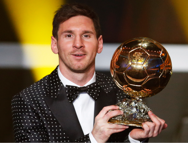 Messi con el Balón de Oro 2012.