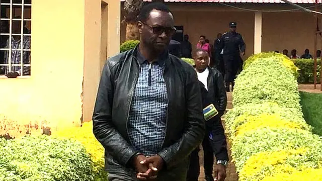 Robert Bayigamba ubwo yajyanwaga mu cyumba cy'urukiko kuri uyu wa gatatu