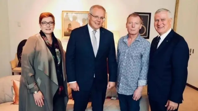 ऑस्ट्रेलिया के प्रधानमंत्री के साथ जिब्राइल उमर