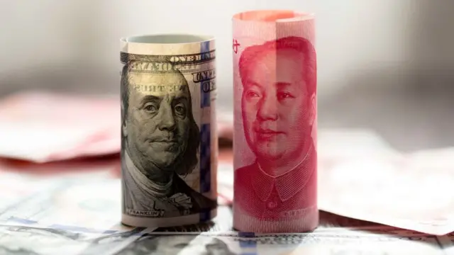 Dollar and Yuan notes.