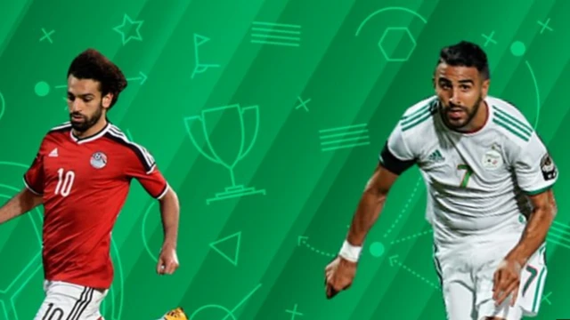 محمد صلاح (يسار) ورياض محرز