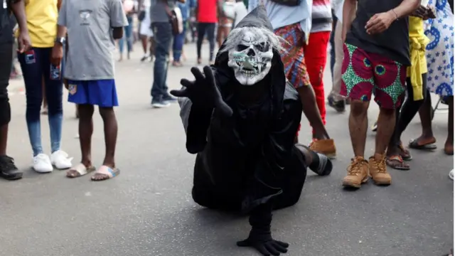 Performer wearing a ghoulish costume