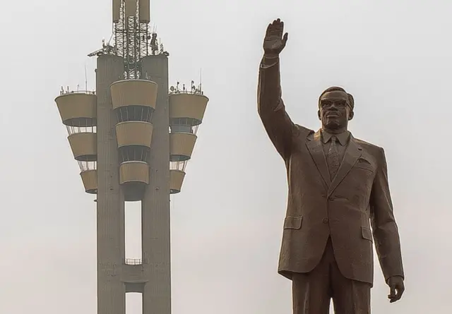 Wannan ne mutum-mutumin firaiminista na farko na ƙasar wato Patrice Lumumba a Kinshasa babban birnin ƙasar. Shekaru da dama bayan kashe shi a 1961, masu shigar da ƙara na ƙasar Belgium sun ce suna bincike kan ganin cewa ko za su iya hukunta waɗanda ake zargi da kisan.