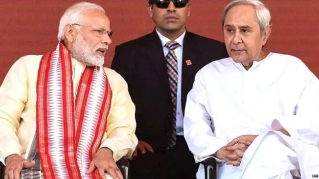 નવીન પટનાયક અને મોદીની તસવીર
