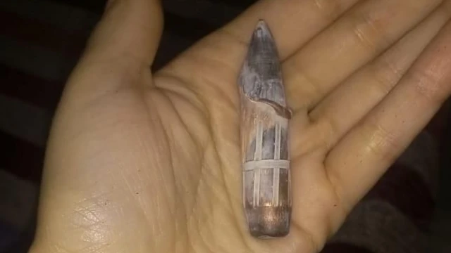 Una bala de rifle largo