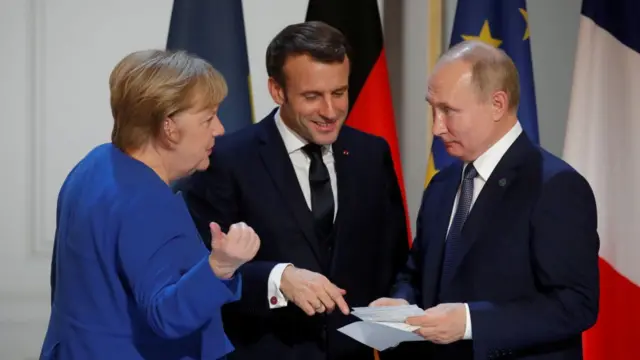Ангела Меркель, Эммануэль Макрон и Владимир Путин