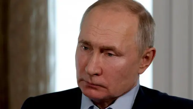 Путин