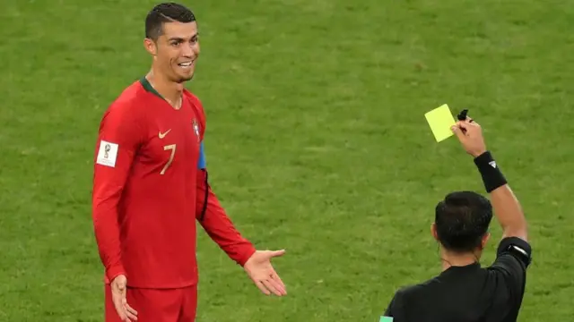 Ronaldo being given yellow card