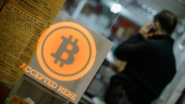 Эмблема биткойна