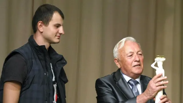 Євген Карась (ліворуч) був активістом ще до Майдану, його організація "С14" свого часу намагалися перешкодити проекту реконструкції Гостинного двору в Києві, який спричинив чимало суперечок