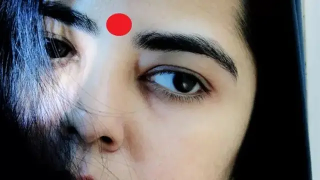 টিপ পরা ছবি